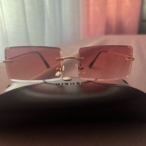 Frameless, red ombré sunglasses
